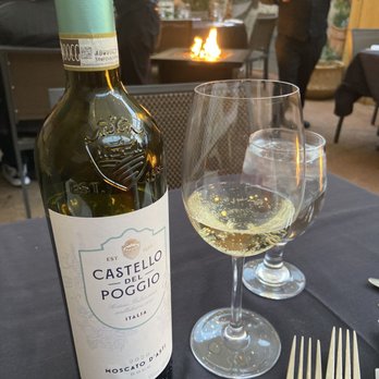 La Scala - Outside next to the fire pit with a tall glass of moscato de asti - Italian Near Me - Baltimore, Maryland
