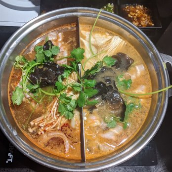 Dada Shabu Shabu Buffet - Mala (left) and Spicy Miso (right) - Korean Near Me - Irvine, California Dada Shabu Shabu Buffet - Mala (left) and Spicy Miso (right) - Korean Near Me - Irvine, California