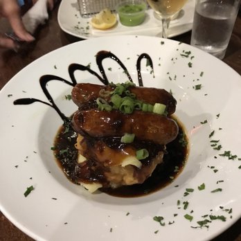 The Hairy Lemon - Bangers and Mash with a huge onion ring in the middle - Irish Pub Near Me - Dublin, D The Hairy Lemon - Bangers and Mash with a huge onion ring in the middle - Irish Pub Near Me - Dublin, D