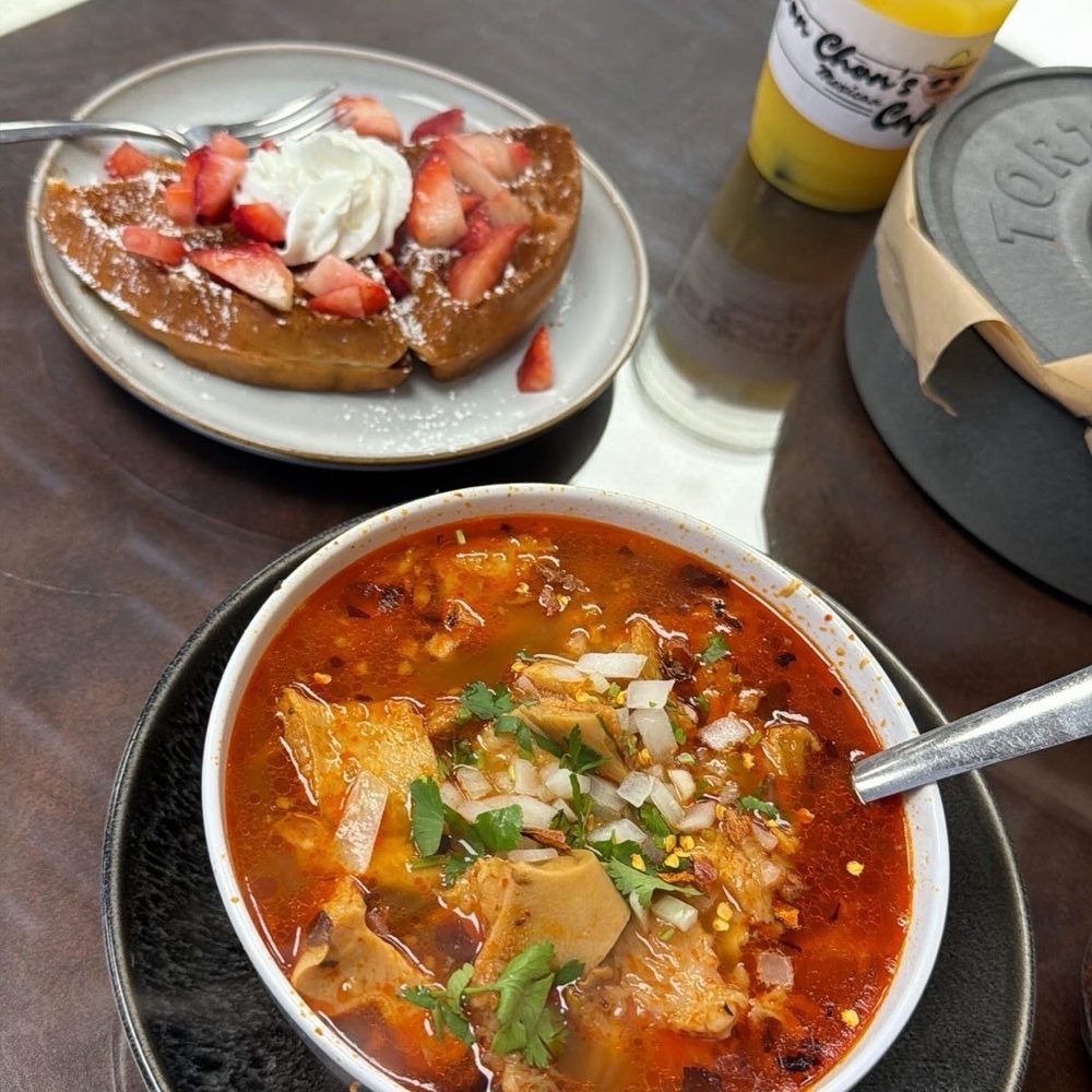 Menudo and kid waffle with an orange juice