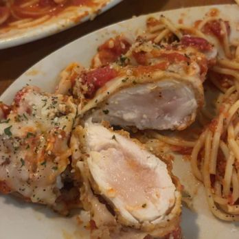 Mike's Pizza and Pasta - a plate of chicken and spaghetti - Pizza Near Me - Hendersonville, North Carolina Mike's Pizza and Pasta - a plate of chicken and spaghetti - Pizza Near Me - Hendersonville, North Carolina