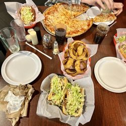 Full table... Ham Boat, Onion Rings (homemade), Pizza