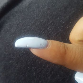 Kim's Nails - One of the nails that i came into fix. It's thicker than the rest, crooked, and dents in the paint that appeared day after, weird - Nail Salons Near Me - University Pl, Washington
