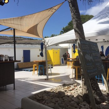 Sapphire Beach Bar - The bar area and the public restrooms behind it. - Burgers Near Me - Smith Bay, Virgin Islands