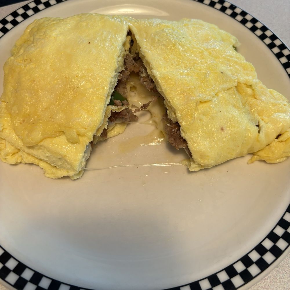 Rock-Cola 50's Cafe - 4 Egg Lumberjack Omelette - Breakfast & Brunch Near Me - Indianapolis, Indiana Rock-Cola 50's Cafe - 4 Egg Lumberjack Omelette - Breakfast & Brunch Near Me - Indianapolis, Indiana