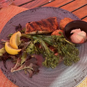 The Deck Seagrill & Bar - Salmon with a side of red potatoes and broccolini - Cocktail Bars Near Me - Virginia Beach, Virginia The Deck Seagrill & Bar - Salmon with a side of red potatoes and broccolini - Cocktail Bars Near Me - Virginia Beach, Virginia