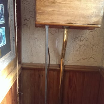 Julian Cafe - The throwback antique toilet flushing handle in the men's room - Bakeries Near Me - Julian, California