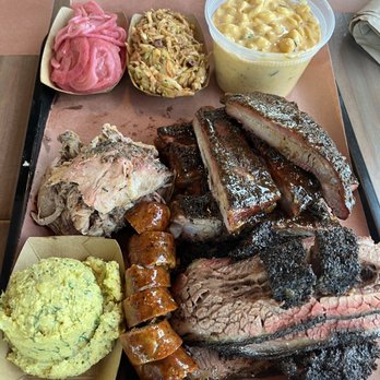 la Barbecue - Pickled red onions, slaw, Mac and cheese, brisket, pork ribs, potato salad, sausage, and brisket - Barbeque Near Me - Austin, Texas la Barbecue - Pickled red onions, slaw, Mac and cheese, brisket, pork ribs, potato salad, sausage, and brisket - Barbeque Near Me - Austin, Texas