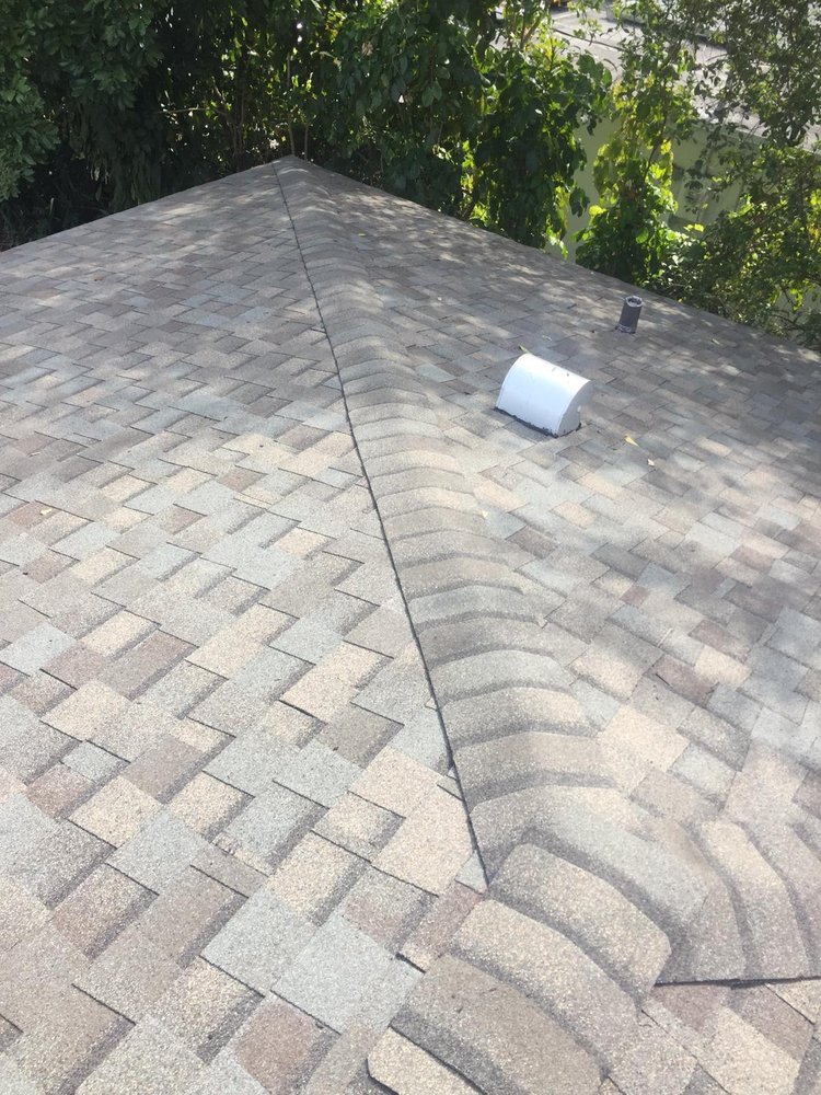 Slide of Perkins Roofing - Miami