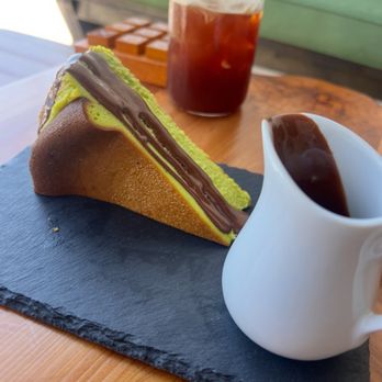 Mar7aba Cafe & Sweets - Tastes so delicious San Sebastián pistachio cake with chocolate on the side ! - Coffee & Tea Near Me - Anaheim, California Mar7aba Cafe & Sweets - Tastes so delicious San Sebastián pistachio cake with chocolate on the side ! - Coffee & Tea Near Me - Anaheim, California
