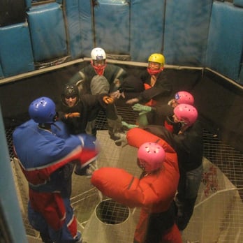 Vegas Indoor Skydiving - Our instructor teaching us how to relax our arms and put our hands out so we can see them instead of to the sides.. - Skydiving Near Me - Las Vegas, Nevada