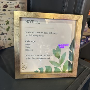 Bewitched Denton - Herbs they don't carry - A framed notice at Bewitched Denton in Denton, TX, states the store does not carry certain herbs, including white sage, juniper, cedar, and tobacco. - Gift Shops Near Me - Denton, Texas