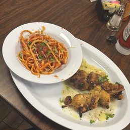 Chicken spiedini and pasta with meat sauce Chicken spiedini and pasta with meat sauce