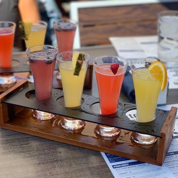 Hash Kitchen Arcadia - Mimosa Flight (From left to right, Blueberry, Pineapple, Strawberry, and Orange Mimosa) - Breakfast & Brunch Near Me - Phoenix, Arizona