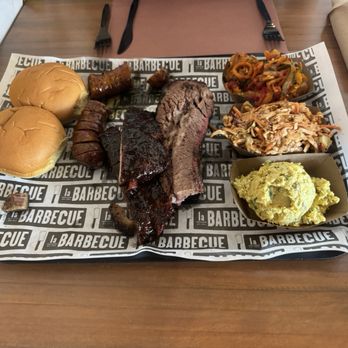 la Barbecue - Potatoe bun , Pork ribs, jalapeno sausage, brisket (both moist and lean), Kim Chee , Cole slaw, potato salad - Barbeque Near Me - Austin, Texas