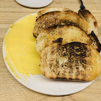 Tomo - Grilled bread and cherry valley butter - New American Near Me - Seattle, Washington Tomo - Grilled bread and cherry valley butter - New American Near Me - Seattle, Washington