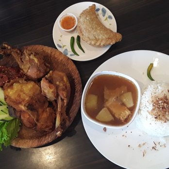 Banana Leaf - Sayur Asem / Tamarind Soup (yummmmm) and Ayam Penyet / Smashed fried chicken (bombdotcom) & Pastel Ayam / Chicken Empanada on a small plate. - Indonesian Near Me - Temple City, California