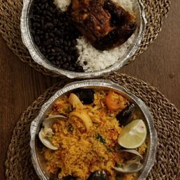 Chicken wirh rice and beans (top)  Seafood paella (bottom)