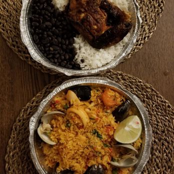 El Pollo III - Chicken wirh rice and beans (top)  Seafood paella (bottom) - Peruvian Near Me - Brooklyn, New York