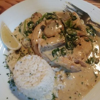 The Mirage Restaurant - Chicken Armani entree with mushrooms and artichokes over rice - American Near Me - Schiller Park, Illinois The Mirage Restaurant - Chicken Armani entree with mushrooms and artichokes over rice - American Near Me - Schiller Park, Illinois