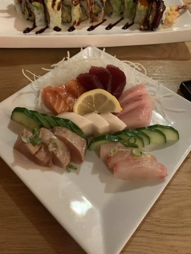 Order Tozai Combination Sashimi (18-20 pieces) food online from Sushi Tozai store, Sebastopol on bringmethat.com