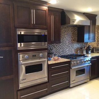EV Cabinets - New kitchen renovations with Mocha cabinets from our JC Collection line and quartz counters - Cabinetry Near Me - Cohoes, New York EV Cabinets - New kitchen renovations with Mocha cabinets from our JC Collection line and quartz counters - Cabinetry Near Me - Cohoes, New York