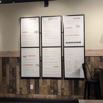 B Town Burger Sushi Bar - Menu on the wall, burgers and sushi and salads drinks and more - Burgers Near Me - Casselberry, Florida