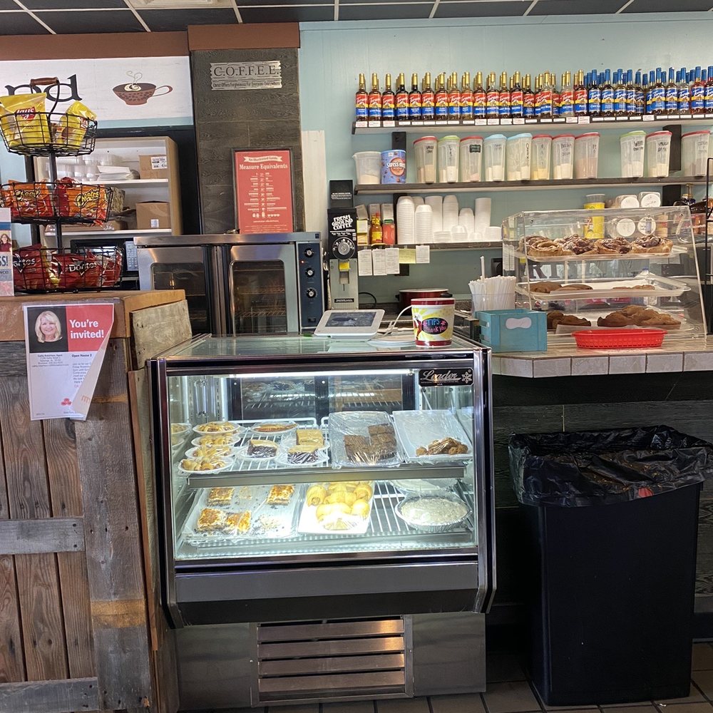 Daily Grind - a bakery with a display of baked goods - Coffee & Tea Near Me - Talladega, Alabama