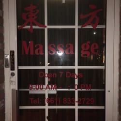 Oriental Health Foot & Body Massage - Door with hours and phone number