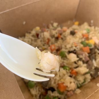Dazi Lounge & Kitchen - a white plastic fork in a box filled with rice and vegetables - Chinese Near Me - Mississauga, Ontario Dazi Lounge & Kitchen - a white plastic fork in a box filled with rice and vegetables - Chinese Near Me - Mississauga, Ontario