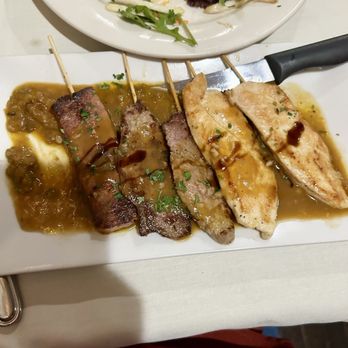 Bistro Mediterranean & Tapas Bar - Pork, Beef & chicken Skewers over lentils . Meat had no seasonings over lentils , just didn't go together . - Spanish Near Me - Westbrook, Connecticut