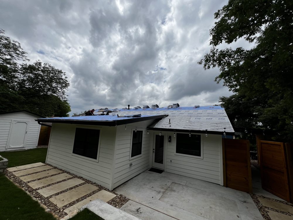 Slide of Greyhound Roofing