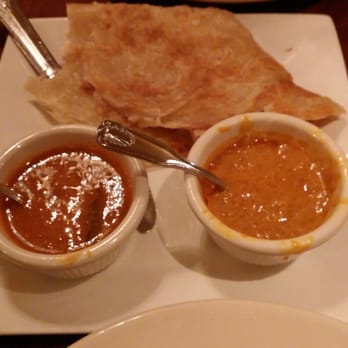 Mingalaba - Paratha and dipping sauces. Potato(?) curry on the left. Coconut curry on the right. - Burmese Near Me - Burlingame, California