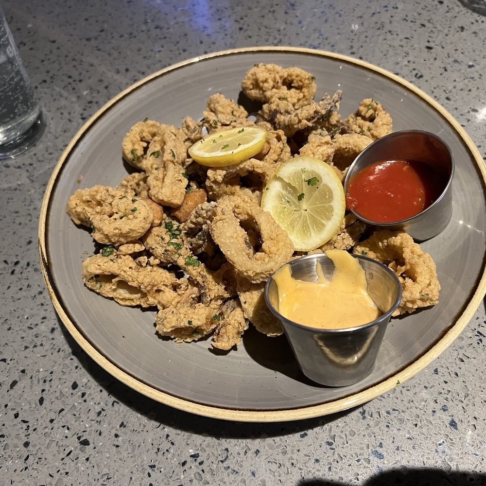 Maggie McFly's | Albany - Fried Calamari Appetizer - New American Near Me - Albany, New York Maggie McFly's | Albany - Fried Calamari Appetizer - New American Near Me - Albany, New York