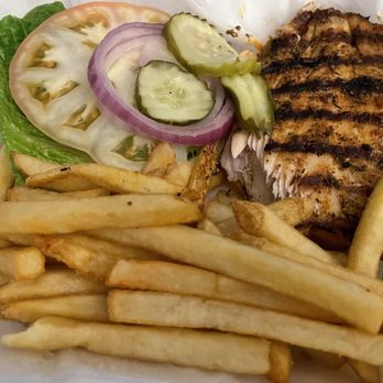 The Landing Beach Bar - Mahi mahi sandwich and fries to go - New American Near Me - Christiansted, Virgin Islands The Landing Beach Bar - Mahi mahi sandwich and fries to go - New American Near Me - Christiansted, Virgin Islands