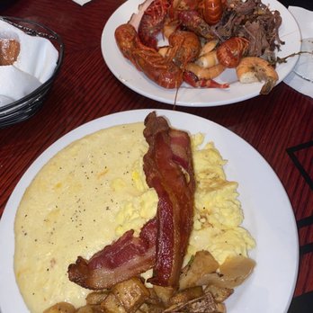 Copeland's - Cheese side of cheesy grits, scrambled eggs, Side of Applewood Smoked Bacon, home fries - Cajun/Creole Near Me - Jacksonville, Florida Copeland's - Cheese side of cheesy grits, scrambled eggs, Side of Applewood Smoked Bacon, home fries - Cajun/Creole Near Me - Jacksonville, Florida