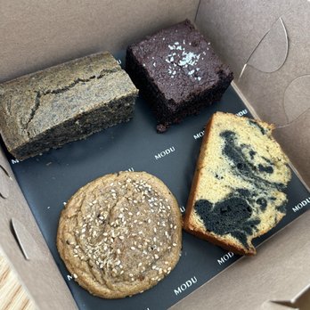 Modu Cafe - Top row: black sesame mochi cake, dark chocolate mochi brownie   Bottom row: miso garu cookie, ssuk marble pound cake - Coffee & Tea Near Me - Los Angeles, California