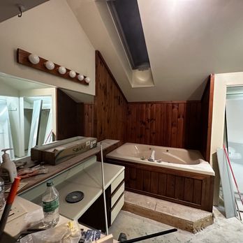 DQ Renovations - Before:  Boring and dated Jacuzzi look - General Contractors Near Me