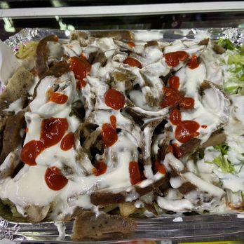 Big Bite - Mix Over Rice (Gyro & Chicken) - Mediterranean Near Me - Houston, Texas Big Bite - Mix Over Rice (Gyro & Chicken) - Mediterranean Near Me - Houston, Texas