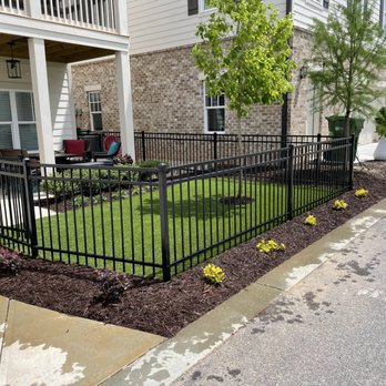 Teos Landscaping - Installation of pet-friendly artificial turf, complemented by natural mulch and new shrubs for a functional and pleasing landscape. - Landscaping Near Me - Powder Springs, Georgia Teos Landscaping - Installation of pet-friendly artificial turf, complemented by natural mulch and new shrubs for a functional and pleasing landscape. - Landscaping Near Me - Powder Springs, Georgia