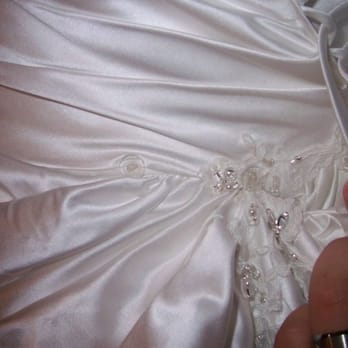 Louise Austrie - Here is one of the five clear buttons. This is a close up but they were undetectable!! - Sewing & Alterations Near Me - Oakland, California Louise Austrie - Here is one of the five clear buttons. This is a close up but they were undetectable!! - Sewing & Alterations Near Me - Oakland, California