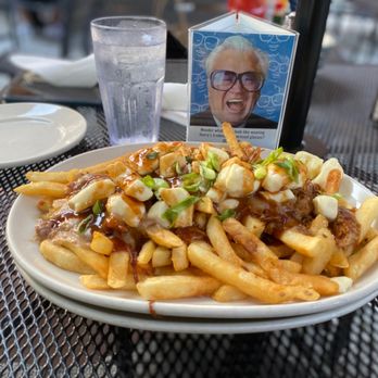 Harry Caray's - Poutine - Sports Bars Near Me - Chicago, Illinois Harry Caray's - Poutine - Sports Bars Near Me - Chicago, Illinois