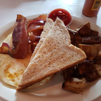 Drew's on Halsted - Two eggs over medium with toast and bacon - American Near Me - Chicago, Illinois Drew's on Halsted - Two eggs over medium with toast and bacon - American Near Me - Chicago, Illinois