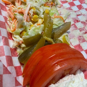 Poulet Sevan - a sandwich with a side of vegetables - Chicken Shop Near Me - Laval, Quebec