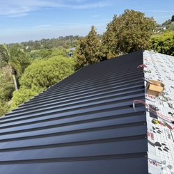 MA Roofing and Gutters - Installing at new roof metal panels in city of rancho palos verdes ca color mata black 16" snop look