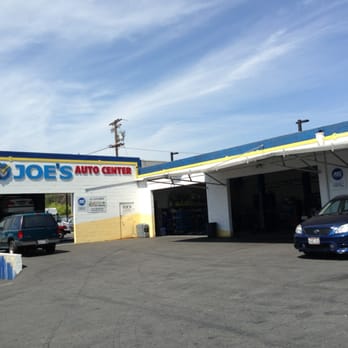Joe's Auto Center - The front of the garages next to Gall's. - Auto Repair Near Me - Long Beach, California