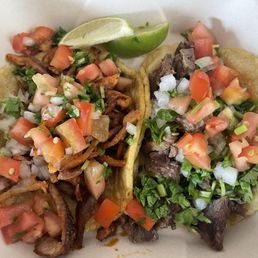 Al pastor on the left and carne asada on the right. Al pastor on the left and carne asada on the right.