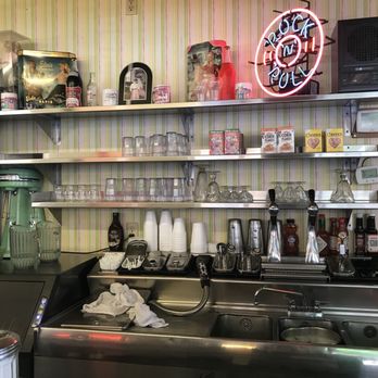 Palmer's Diner - a counter with a neon sign above it - Diners Near Me - Marshallton, Pennsylvania Palmer's Diner - a counter with a neon sign above it - Diners Near Me - Marshallton, Pennsylvania