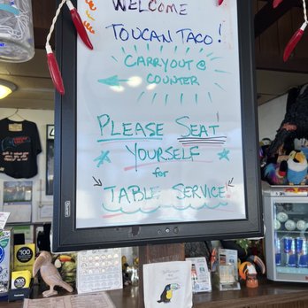Toucan Taco - a sign in a restaurant - Mexican Near Me - Laurel, Maryland