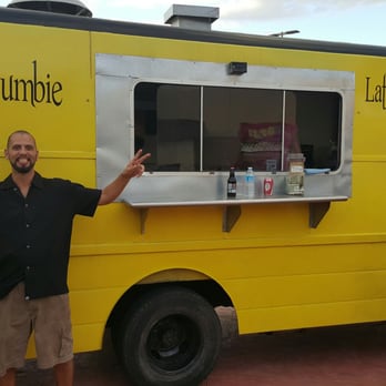 Dc jumbie - a man standing in front of a food truck - Food Trucks Near Me - Tucson, Arizona